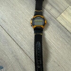Casio black and yellow digital watch